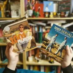 Dwie książki: "1001 filmów, które musisz zobaczyć" z Bradem Pittem i "1001 seriali, które musisz obejrzeć". Idealne na wieczory z kultowymi filmami i serialami.