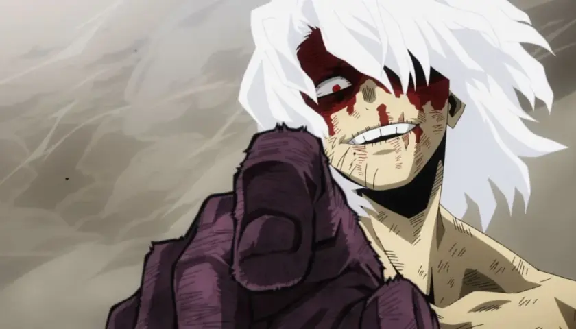 Tomura Shigaraki z My Hero Academia, z krwawymi śladami na twarzy, wskazuje palcem. Ile sezonów ma My Hero Academia?
