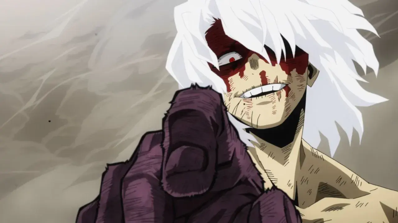 Tomura Shigaraki z My Hero Academia, z krwawymi śladami na twarzy, wskazuje palcem. Ile sezonów ma My Hero Academia?